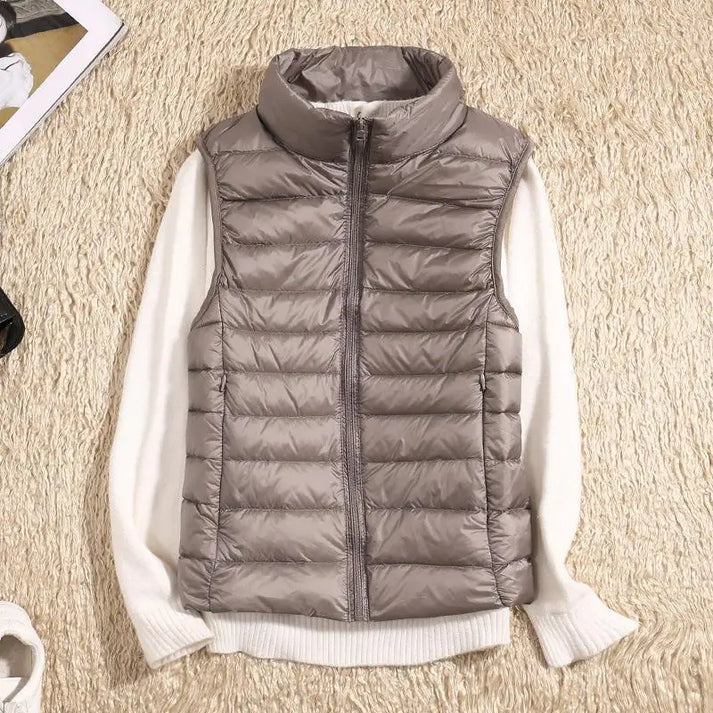 Gisele - Gilet Doudoune Femme - Isolation Matelassée Légère et Col Haut Sans Manches